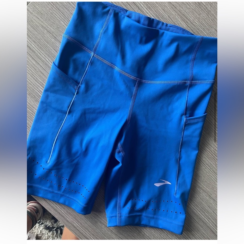 Blue Biker Shorts. Brand is Brooks (like the shoe brand)